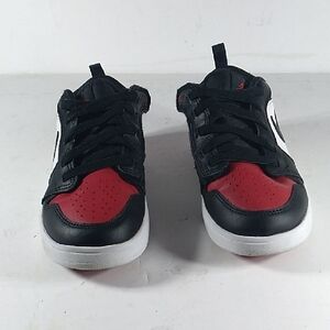 Nike Kids Black and Red Sneakers That's Size 2.5Y.